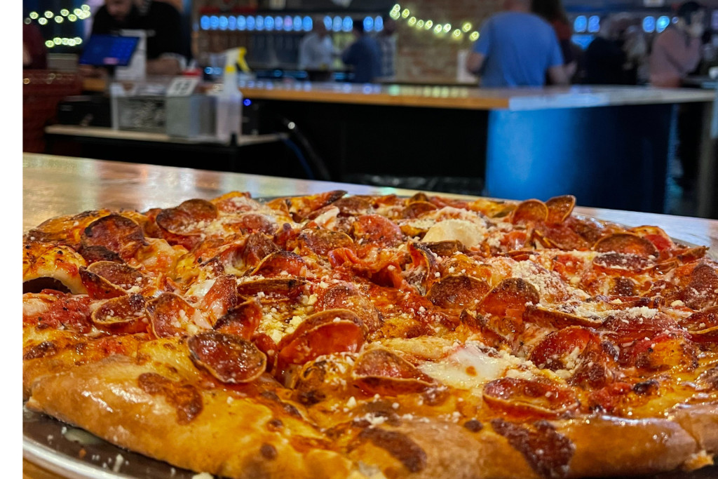 Best Pizza Cleveland – Whistle Taproom pizzas, including cheese, pepperoni, and supreme, served with fresh ingredients and a wide beer selection.