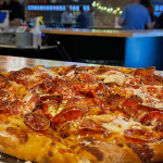 Best Pizza Cleveland – Whistle Taproom pizzas, including cheese, pepperoni, and supreme, served with fresh ingredients and a wide beer selection.