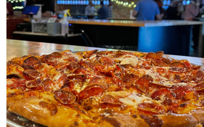 Best Pizza Cleveland – Whistle Taproom pizzas, including cheese, pepperoni, and supreme, served with fresh ingredients and a wide beer selection.